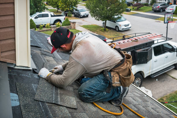 Professional Roofing technician working in Belfair, WA